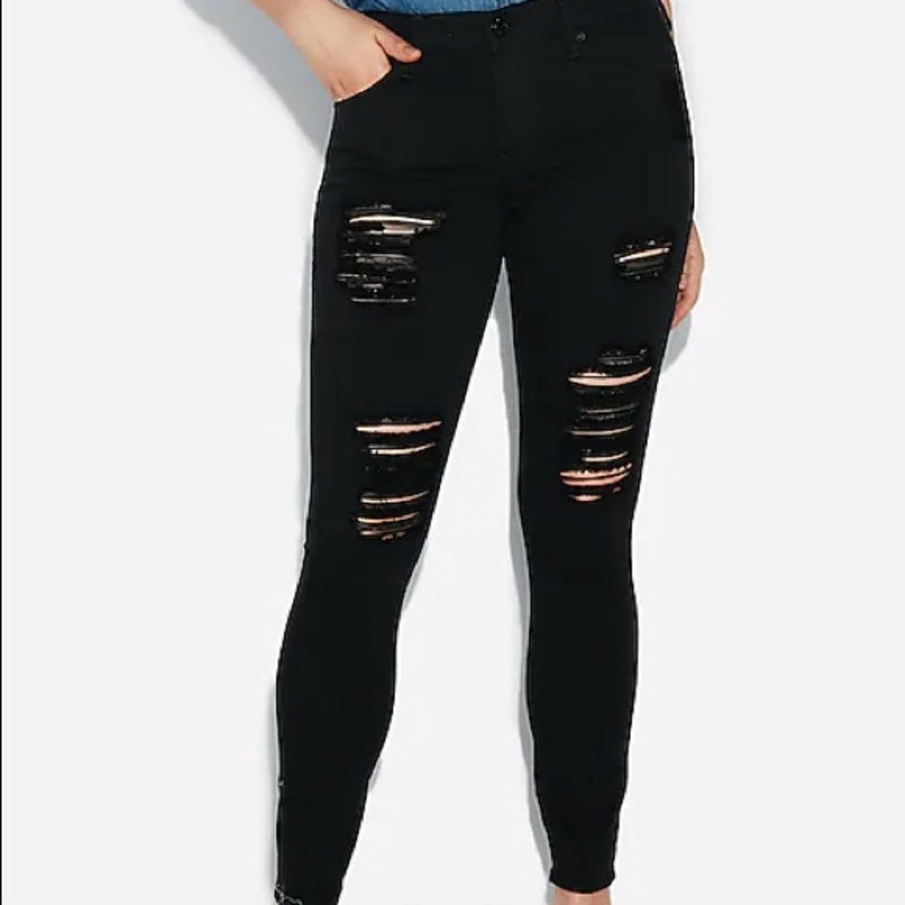 Express black mid rise ripped jeggings